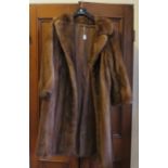 A full length mink coat in mid brown with classic lapel collar 1960/70s. (1)