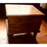 A 19 century mahogany commode, rectangular top hinged lid revealing a pine inlay over a ceramic