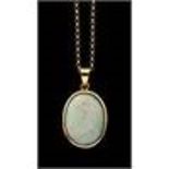 An 18K opal Pendant, the oval cabochon approx. 19m
