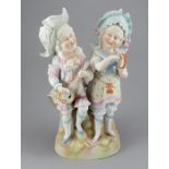 A late nineteenth century German bisque figure c. 1895. It depicts two children playing musical