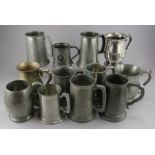 A collection of twentieth century pewter tankards and one silver plate tankard. Mainly used as