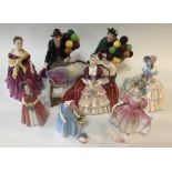 Eight Royal Doulton Figures: Balloon Seller, Balloon Man, belle O' The Ball, Day Dreams, Adrienne,