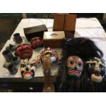Assorted sundries and curiosities, to include various tribal and other face masks and headdress,