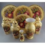 A group of Aynsley bone china wares to include vases and plates, each decorated with fruit and