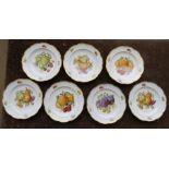 A set of seven Rosenthal moulded plates printed with fruit designs. 21cm wide. (7) Condition: One