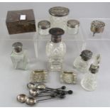 A mixed group of hallmarked silver items including spoons, ash trays, scent bottles, one with a