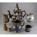 A group of lustre wares to include jugs, mugs, a pepper pot, a Grays jug and a large Barge ware