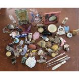 A large and assorted collection of scent bottles, stoppers, small picture frames, a folding fan