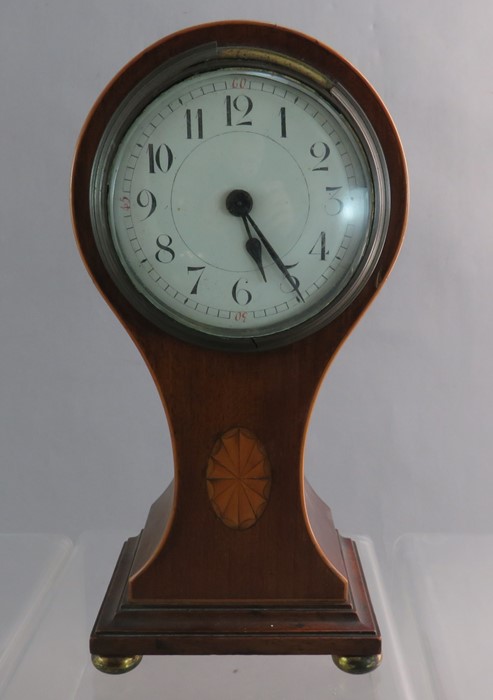 A small size Sheraton revival with shell marquetry inlay clock. 23 cm tall.