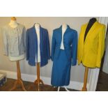 A collection of costumes to include a teal coloured linen suit with a top pocket made by Bernard