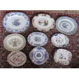 A group of nineteenth century transfer-printed and coloured platters, c.1860-90. 40 - 52 cm wide. (