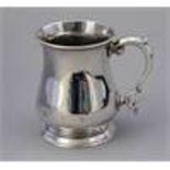 A George II silver baluster half pint mug, double
