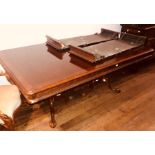 A George III revival mahogany pedestal table, pull-out extension with extra leaves raised on