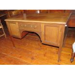 An Edwardian mahogany sideboard on tapered legs with inlay. 121cm long.  Faded.