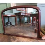 A modern wall hanging/over-mantle mirror with wooden frame. 109cm