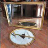 Two decorative twentieth century gilt famed mirrors. 69 cm and 100 cm wide. (2)