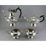 A plated tea / coffee service to include: coffeepot, teapot, sugar and creamer.