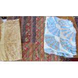 A heavily quilted Edwardian 1920s quilt in autumnal shades, both sides damaged to patchwork, a