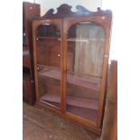 A late Victorian mahogany bookcase, originally the upper half of a two-tier bookcase, having two