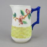 A late nineteenth century continental moulded jug, possibly German, c. 1880. It is decorated with