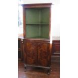 A nineteenth walnut corner display cabinet on cabriole legs. 182 cm tall. Upper doors removed to aid