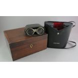 A mahogany lidded box with key, a cased set of Pentax binoculars and a similar pair of