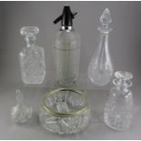 A group of moulded and cut glass to include: decanters, a cut-glass trifle bowl, a soda syphon etc.