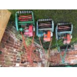 Garden equipment: three Suffolk Punch lawnmowers, strimmer and hedgecutters.
