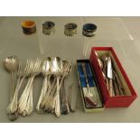 A group of stainless steel and EPNS cutlery and four napkin rings, some boxed. (q)