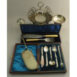 A group of plated EPNS wares to include: a boxed fisher server, a boxed fruit serving set, and