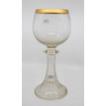 A large gilt rimmed goblet