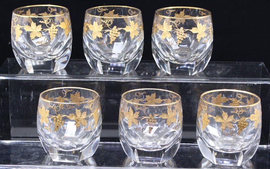 A set of six faceted crystal tumblers, gilt vine decoration (6)