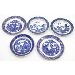 Four blue and white Old Willow pattern plates and four saucers (8)