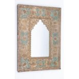 A white metal embossed rectangular mirror, numbered 980, possibly middle eastern, approx 23.5cm x