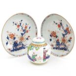 A pair of 19th century Chinese plates; and a 20th century ginger jar and cover (3)