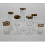 Seven assorted gilt rims, tumblers, wine, flute (7)