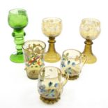 Six Continental green glass goblets, mugs and tumbler, etched, jewelled and enamelled (6)