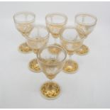 A set of six gilded and enamelled glasses