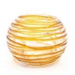 An orange and clear glass globular shade