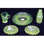 Uranium glass - a pair of ashtrays (ex-Christies labels); scent bottle; cup; dish (5)