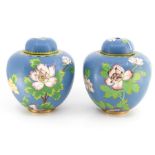 Oriental ware - a pair of cloisonne vases and covers