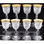 Eight cut crystal wine glasses, gilt rims (2 sets of four) (8)