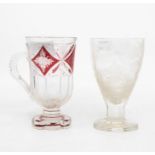 Two etched glasses, one with stags in woodland; the other with ruby flash