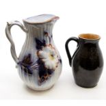 A studio pottery turquoise glazed jug, by William Fishley Holland; other jugs and vase (4)