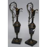 A pair of late 19th century Belgian black marble and gilt bronze  "Etruscan" style decorative