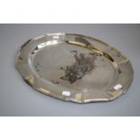 Theodore Starr, New York, a silver oval meat platter with shaped paneled rim, stamped Stirling, 45 x