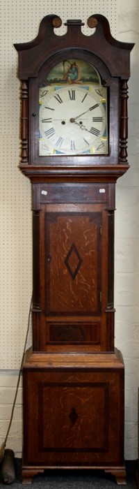 An early 19th century oak and mahogany longcase clock, the painted arched dial supporting a bell