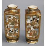 A pair of Japanese Meiji Satsuma vases of shouldered rectangular paneled form, decorated with