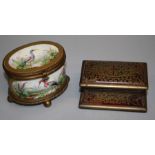 A 19th century Continental porcelain, gilt metal mounted box of oval form. The hinged cover and body