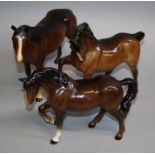 A Beswick brown glazed Stocky Jogging mare (third version), a model 1549 brown horse and one other